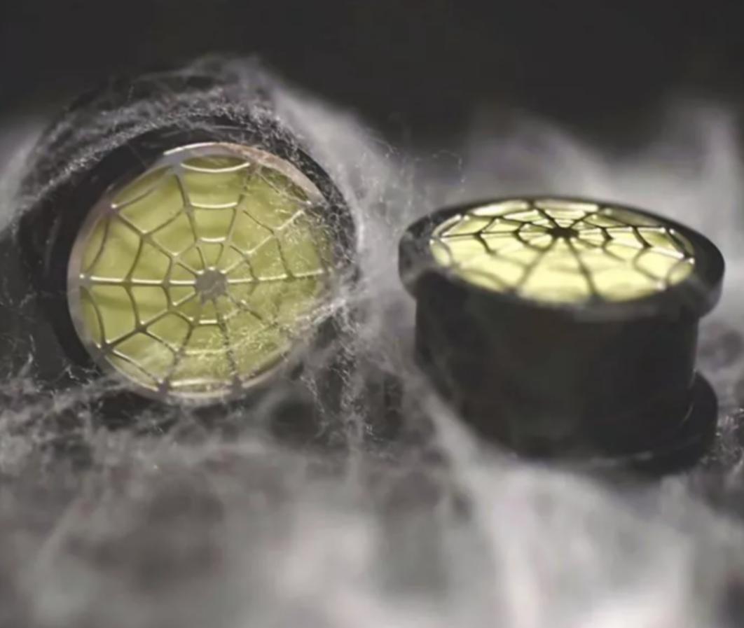 7/8GA-22mm Glow in dark Acrylic Plug with metal spider web cutout front sold as pair